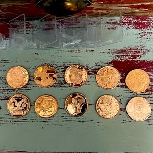 SET OF 10 - 1 OZ .999% COPPER BULLION STAMPED COINS